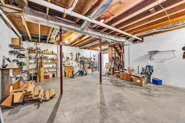 a view of a dry yard with mountains in the background