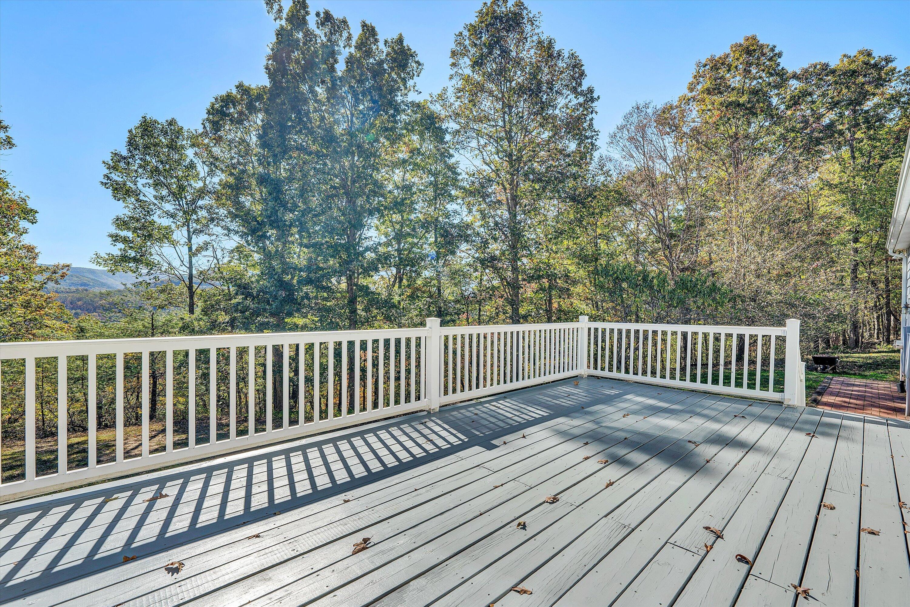 401 Piney Ridge Road Covington, VA 24426 - Photo 51 of 83 a view of deck with wooden floor and fence