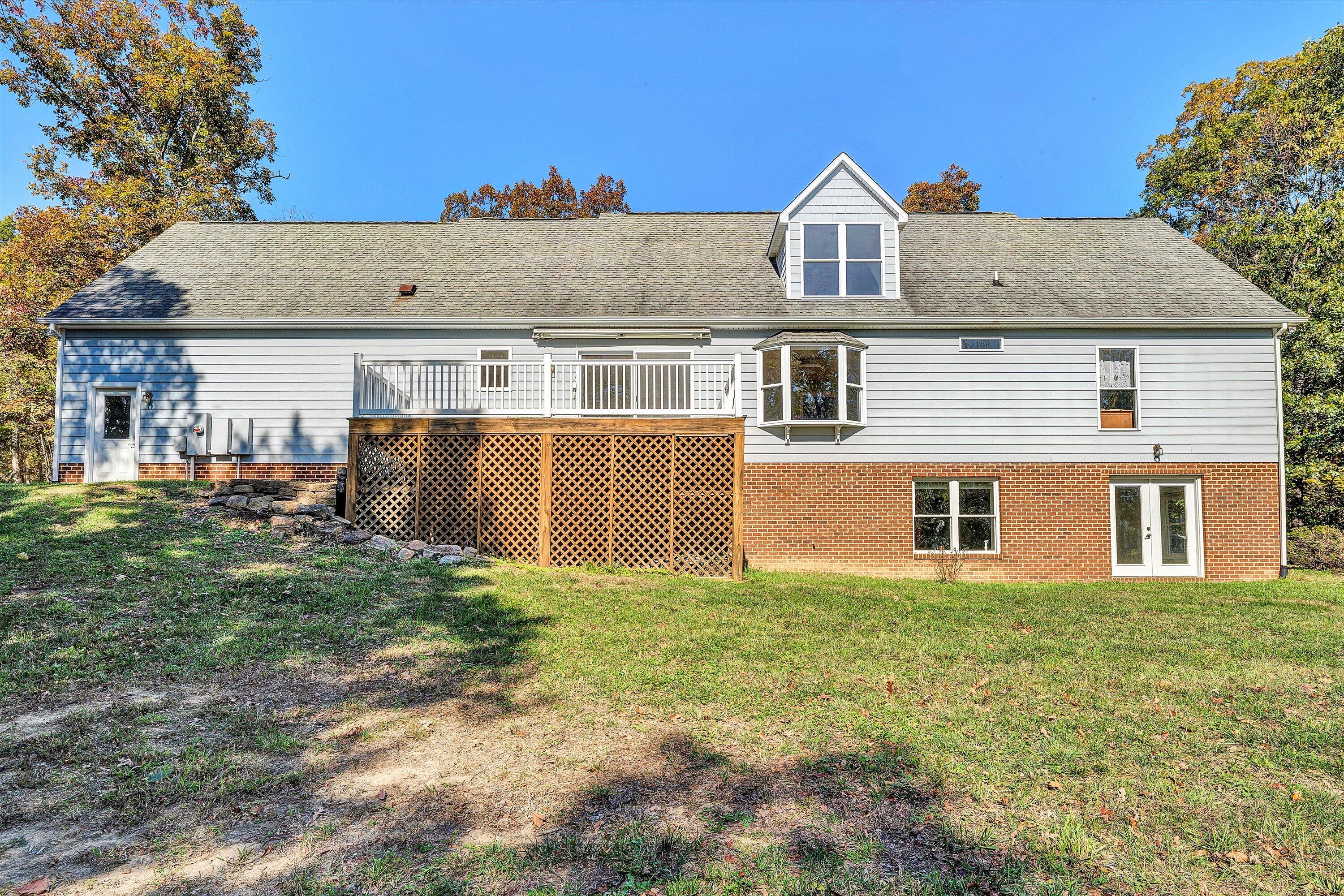 401 Piney Ridge Road Covington, VA 24426 - Photo 57 of 83 a front view of a house with a yard