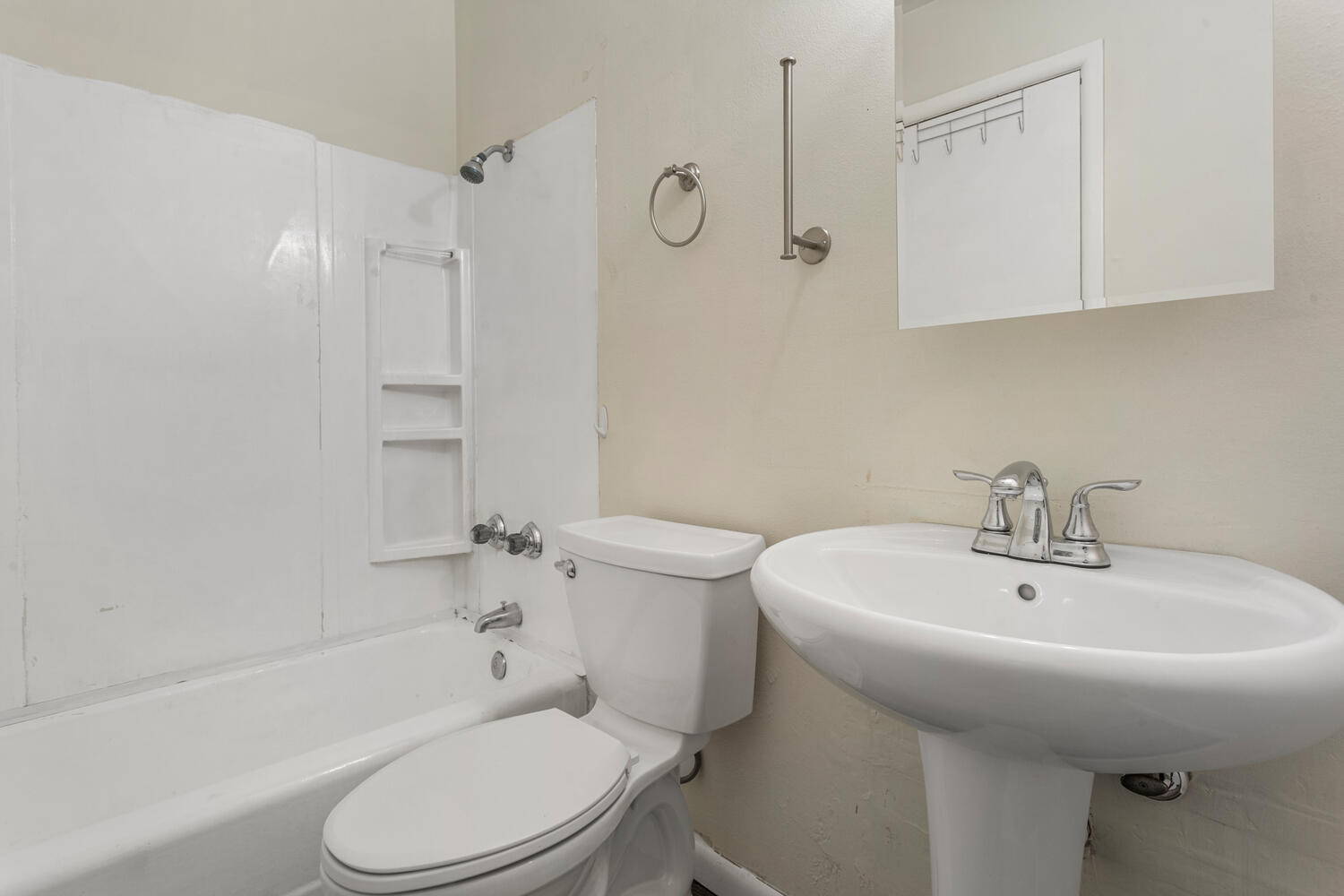 1504 North Mattis Avenue Champaign, IL 61821 - Photo 14 of 21 a bathroom with a sink a toilet and shower