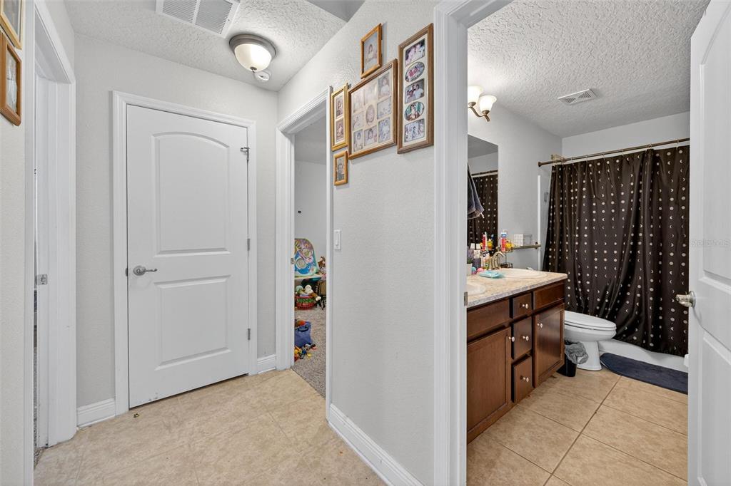 2005 Angel Fish Loop Leesburg, FL 34748 - Photo 26 of 54 a view of walk in closet with window