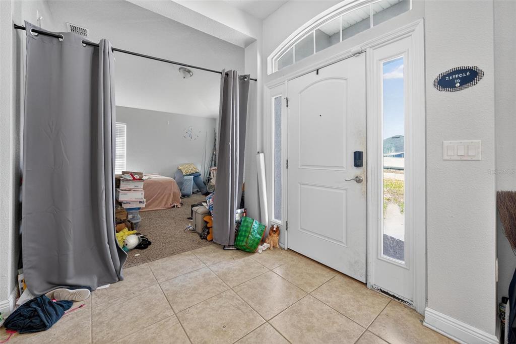 2005 Angel Fish Loop Leesburg, FL 34748 - Photo 10 of 54 a view of a bathroom with a shower and a mirror
