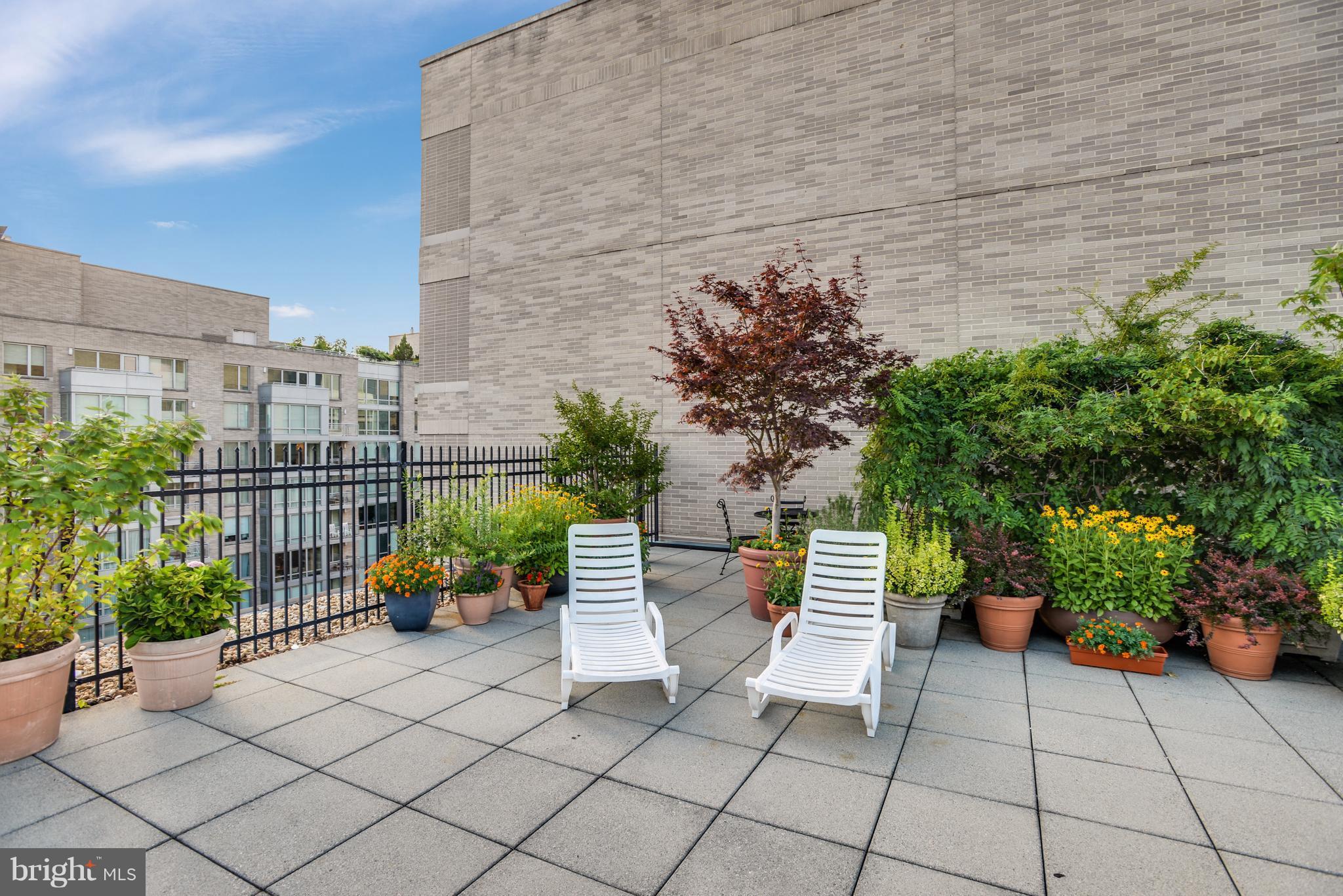 2201 L Street Northwest, Unit 500 Washington, DC 20037 - Photo 27 of 43 a view of a chairs and table in the patio