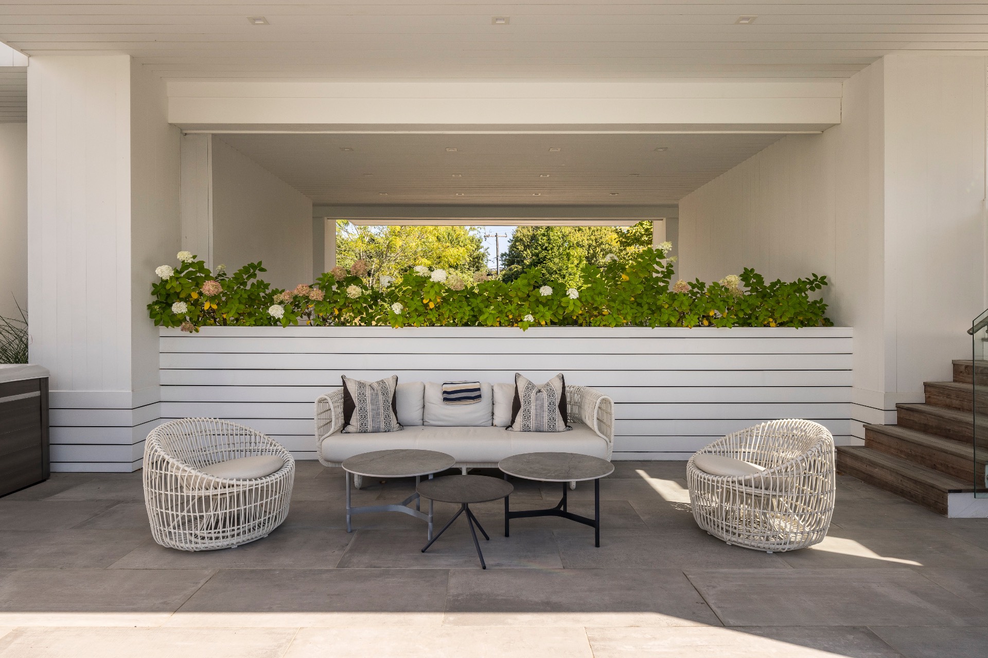 1076 Ocean Road Bridgehampton, NY 11932 - Photo 23 of 35 a view of table and chair in the patio