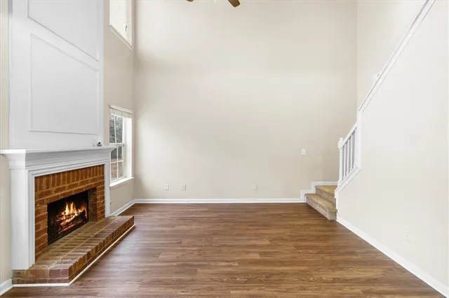 a view of an entryway with wooden floor