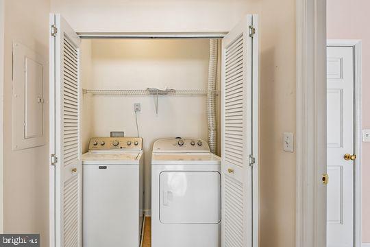 9511 Kingscroft Terrace, Unit 9511F Perry Hall, MD 21128 - Photo 20 of 38 a utility room with dryer and washer