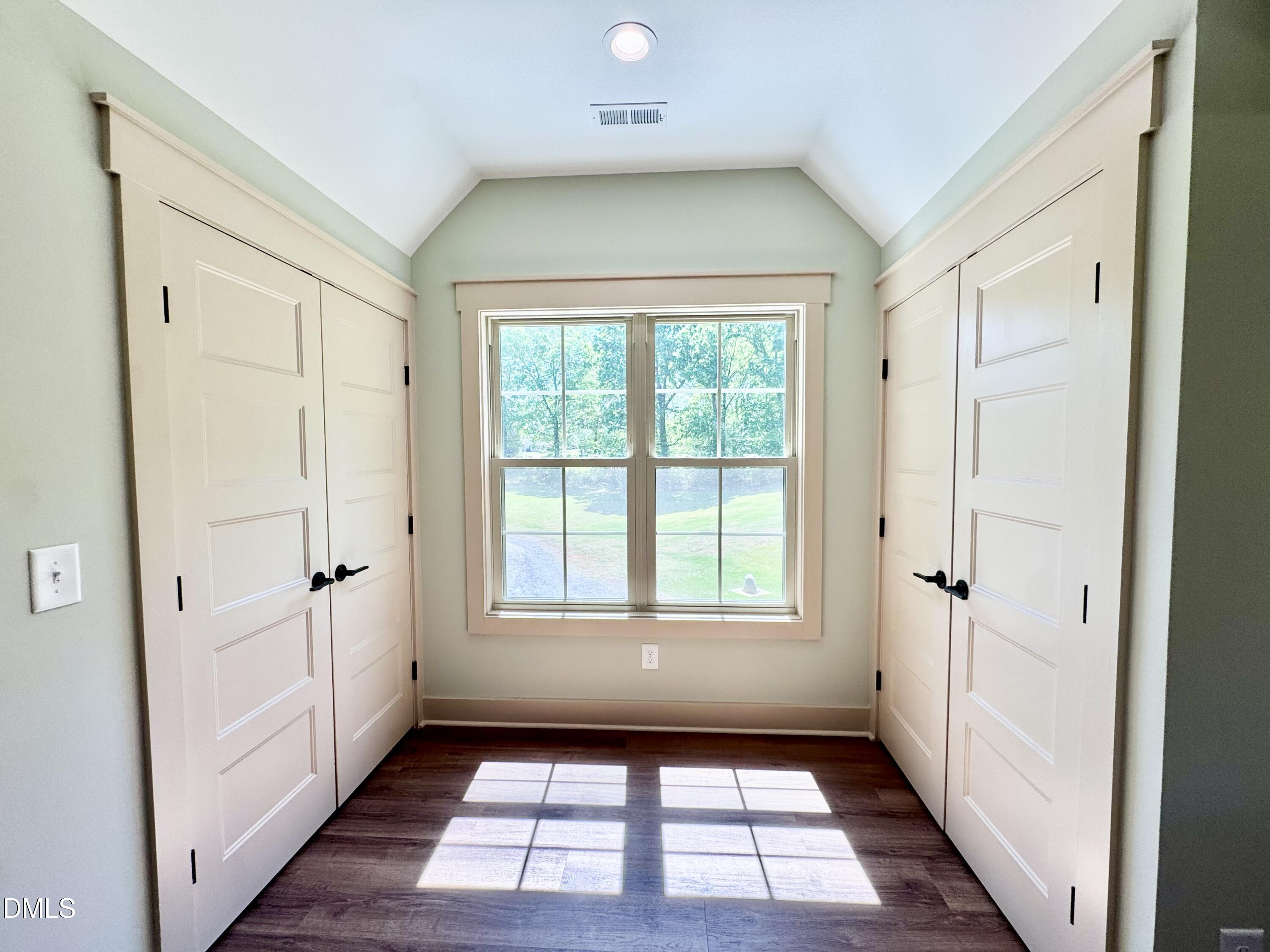 254 Fairway Drive Roxboro, NC 27574 - Photo 16 of 28 wooden floor in an empty room with a window
