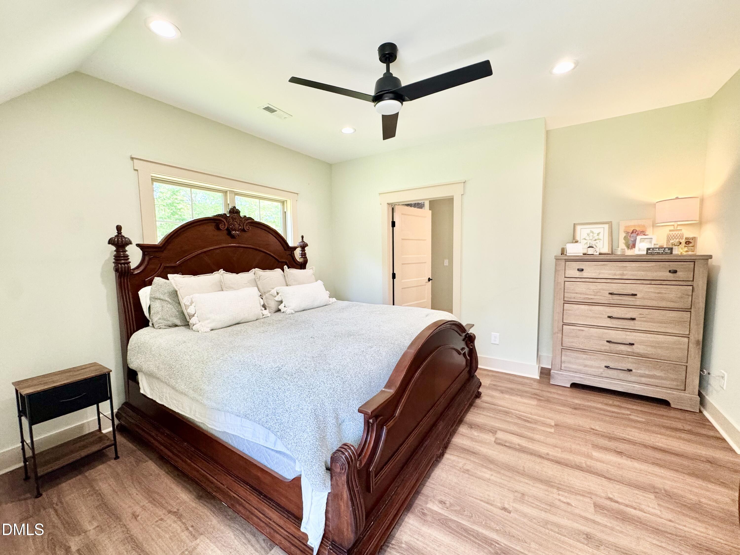 254 Fairway Drive Roxboro, NC 27574 - Photo 17 of 28 a bed room with a bed and a closet