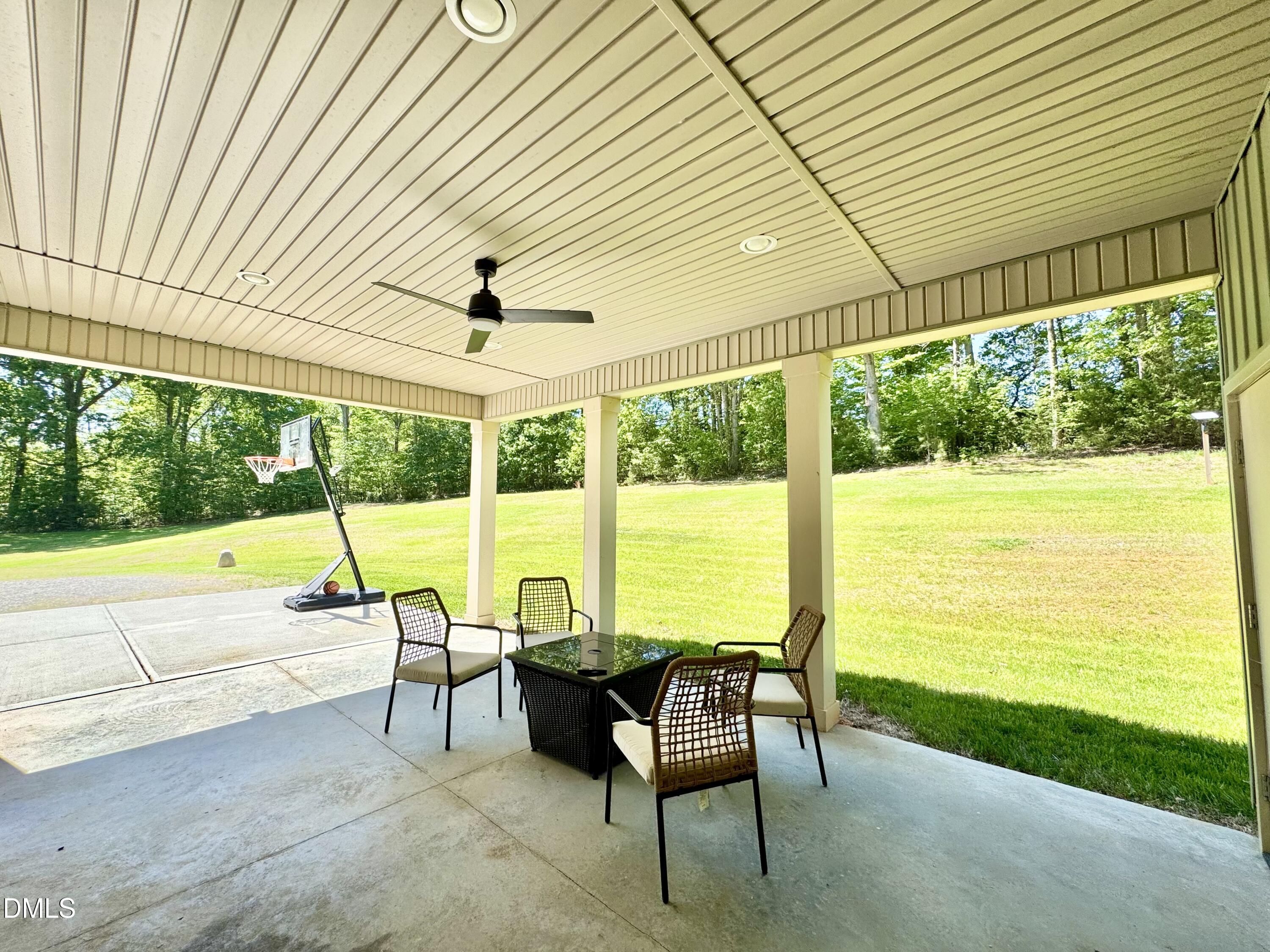 254 Fairway Drive Roxboro, NC 27574 - Photo 24 of 28 a view of a swimming pool and outdoor seating
