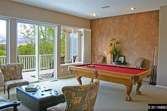 1785 Caughlin Creek Road Reno, NV 89519 - Photo 5 of 13 a living room with furniture and a floor to ceiling window