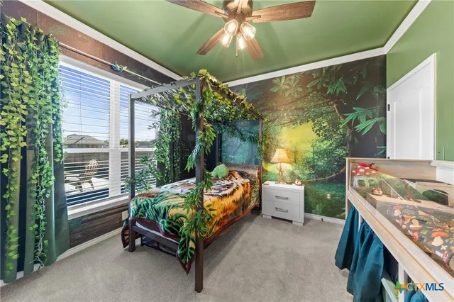 a bathroom with a window a toilet and a shower