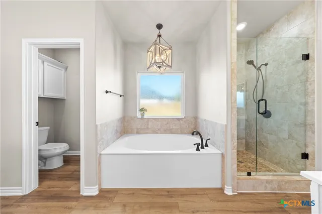 a bathroom with a sink vanity and a mirror