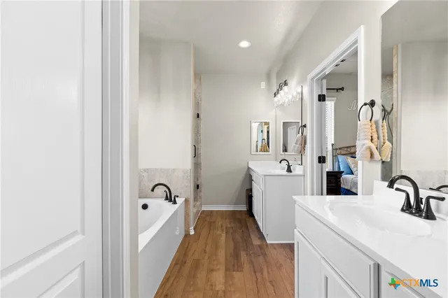 a living room with fireplace furniture and a flat screen tv