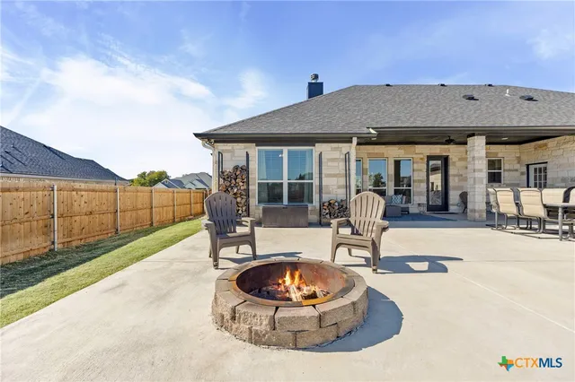 a outdoor view with swimming pool and trees