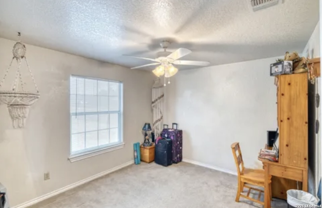 622 South Oak Street Pearsall, TX 78061 - Photo 15 of 22 a view of a room with gym equipment
