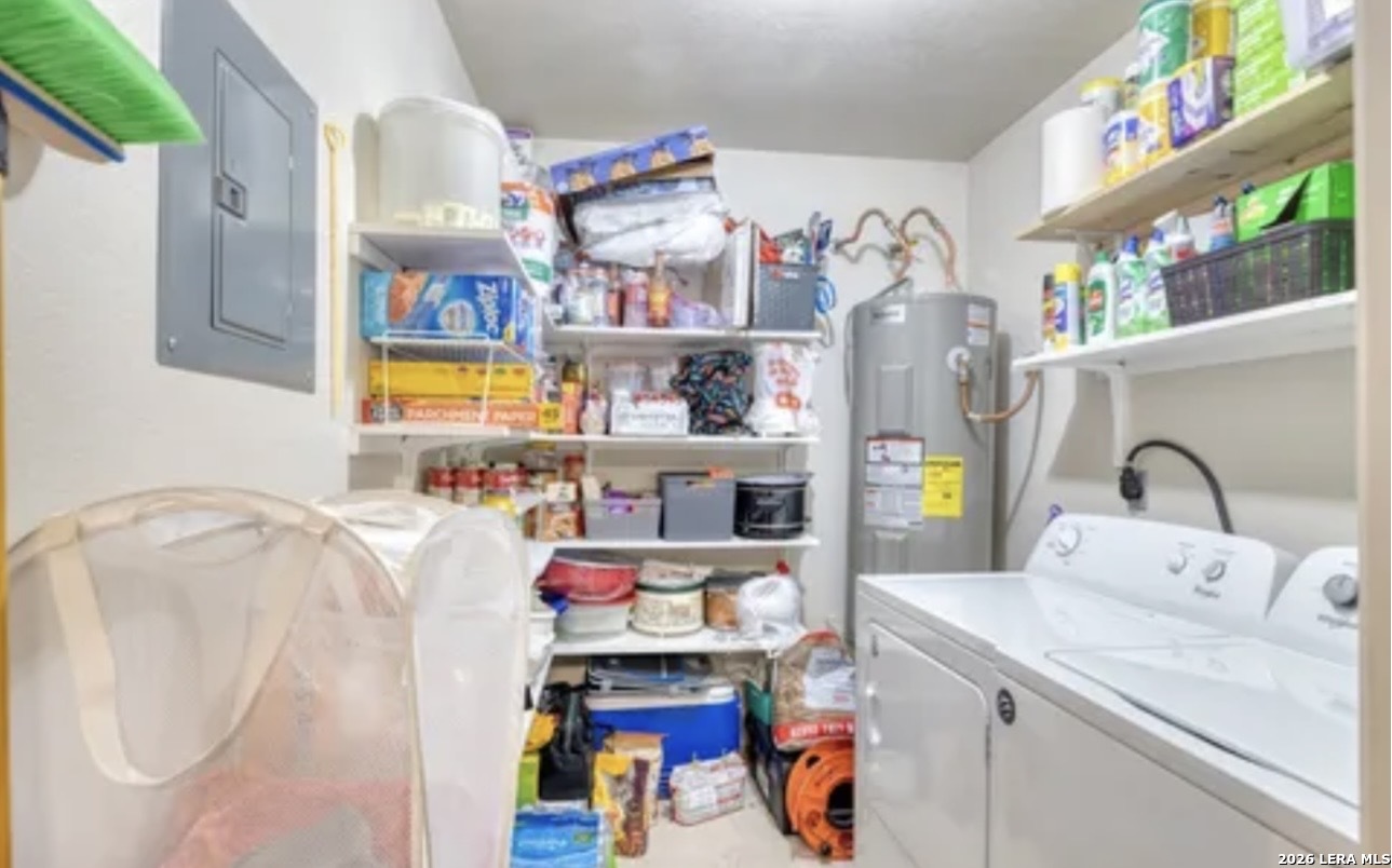 622 South Oak Street Pearsall, TX 78061 - Photo 18 of 22 a room with storage and utility