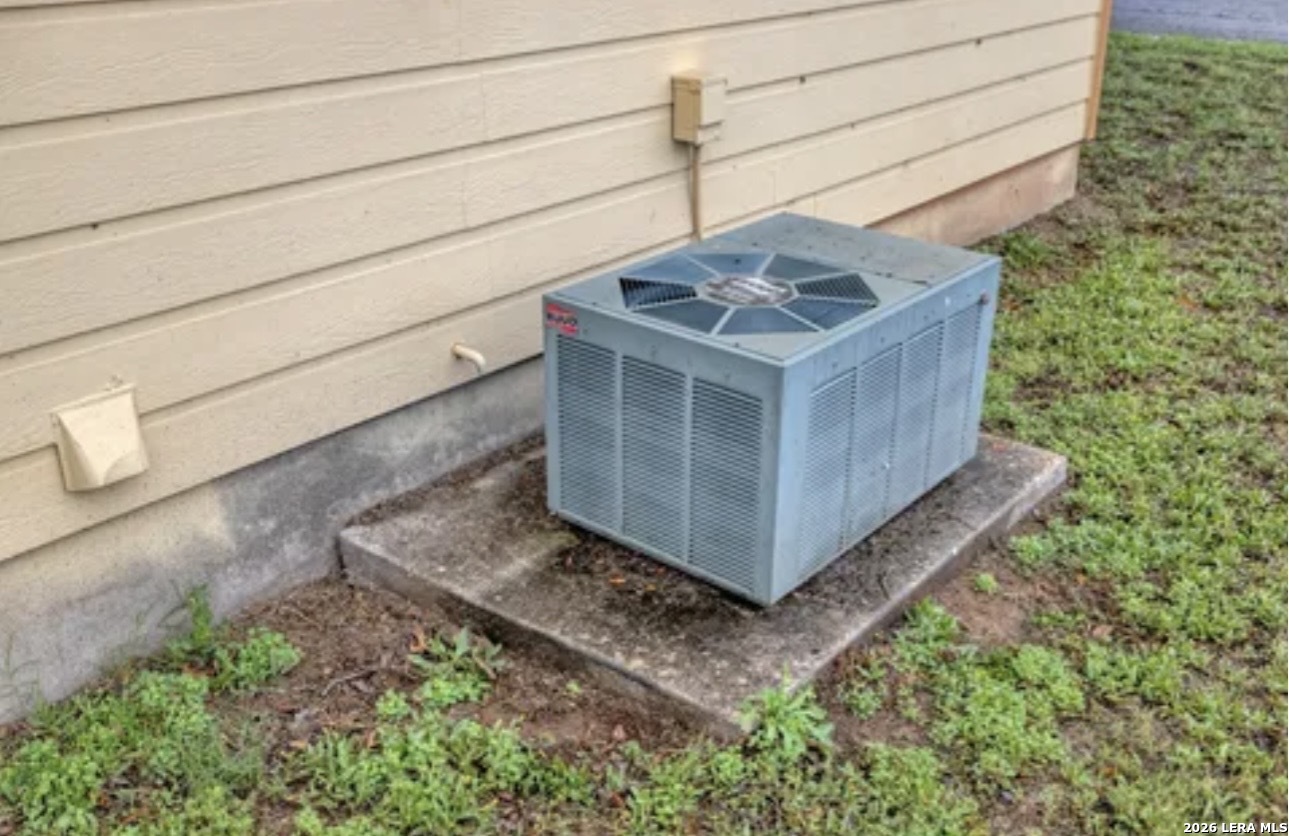 622 South Oak Street Pearsall, TX 78061 - Photo 21 of 22 a view of a backyard with plants