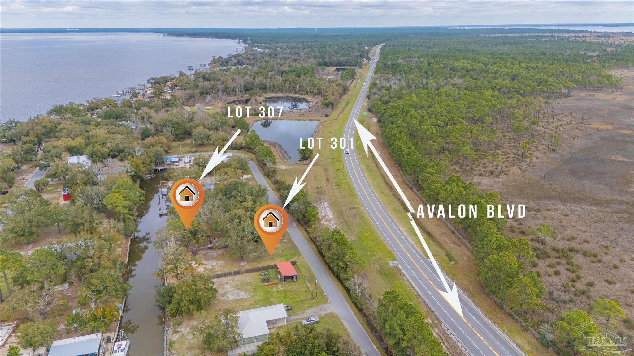 307 Katie Street Milton, FL 32583 - Photo 5 of 17 a view of a tennis court