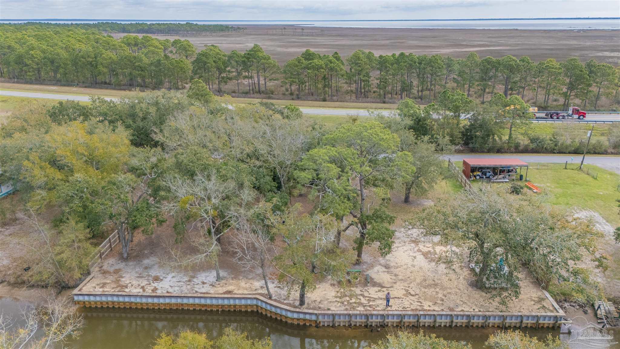 307 Katie Street Milton, FL 32583 - Photo 9 of 17 a view of a water pond
