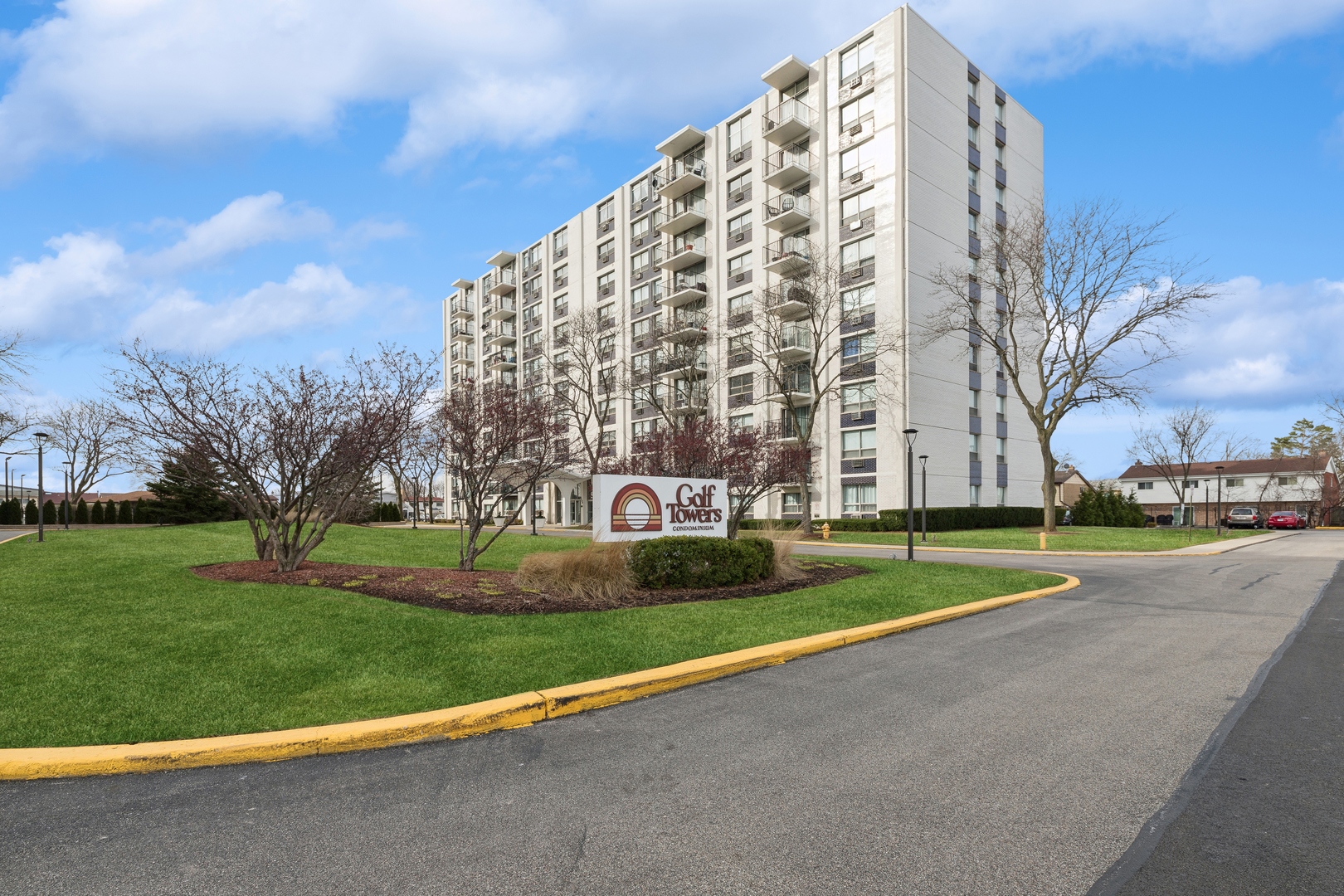9009 Golf Road, Unit 10F Des Plaines, IL 60016 - Photo 1 of 17 front view of a building with a street