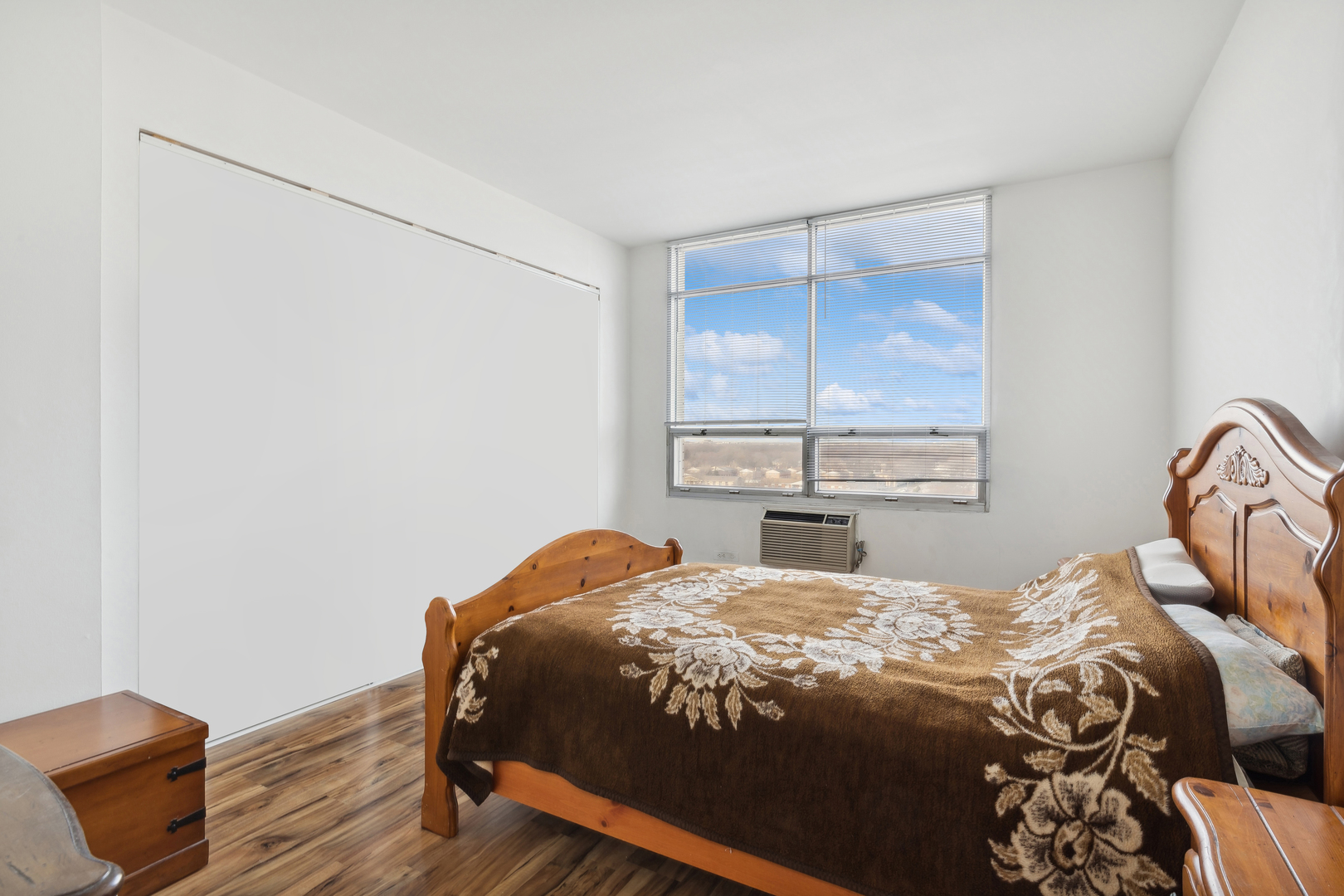 9009 Golf Road, Unit 10F Des Plaines, IL 60016 - Photo 13 of 17 a bedroom with a bed and window