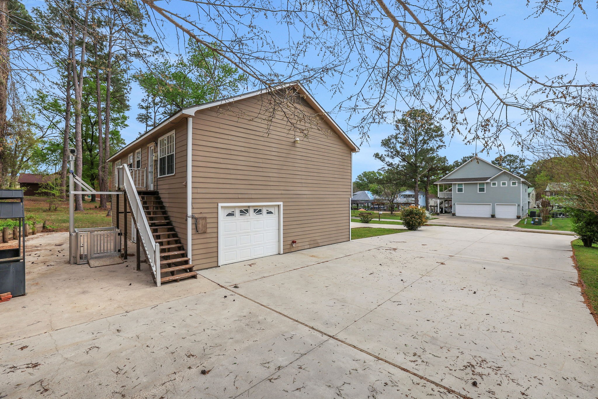 360 Holiday Lane Coldspring, TX 77331 - Photo 35 of 40 There is an attached garage and separate storage shed