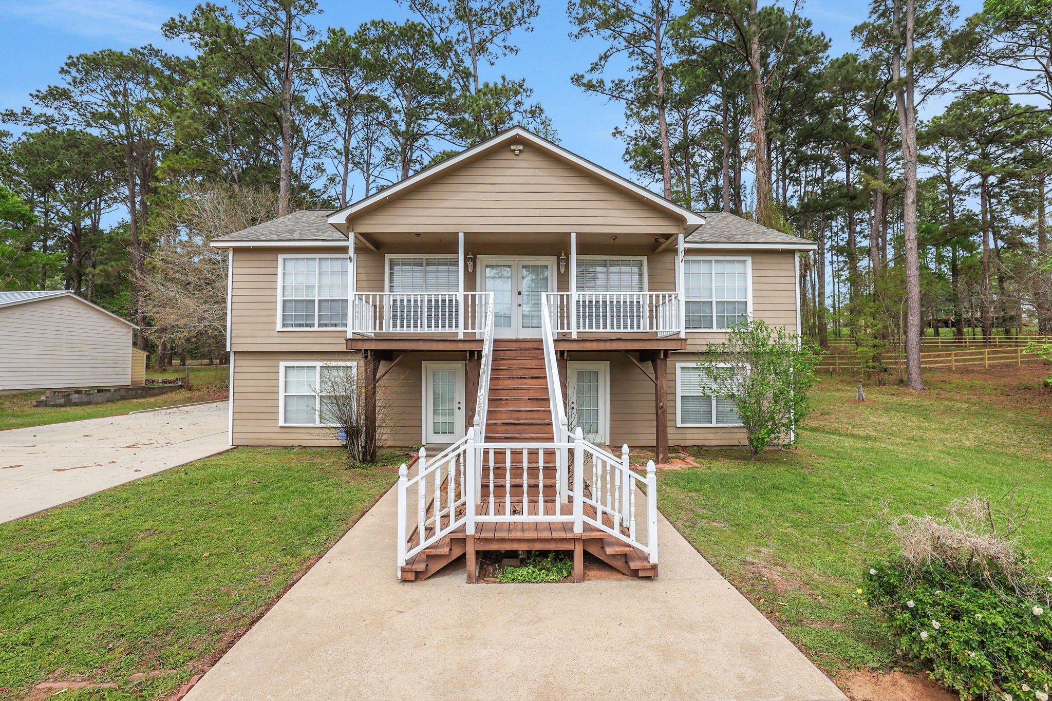 360 Holiday Lane Coldspring, TX 77331 - Photo 4 of 40 The two story home is 2,440 sf - room for family and guests with 4-5 bedrooms