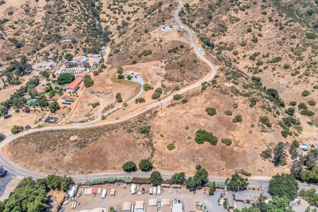 0 Harbison Canyon Road El Cajon, CA 92019 - Photo 18 of 28 a view of a wooden wall with a tree in the background