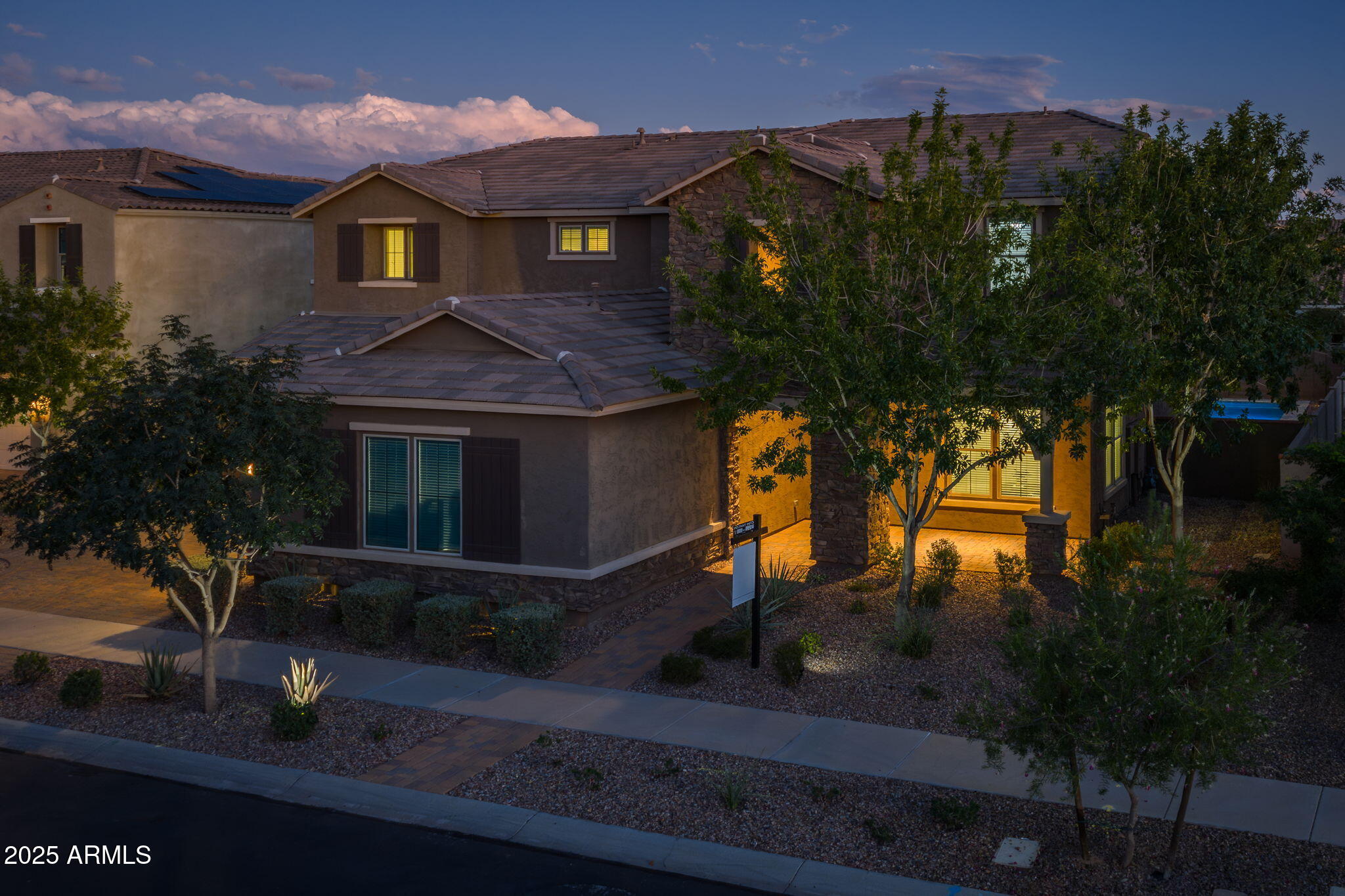 10535 Diffraction Avenue Mesa, AZ 85212 - Photo 8 of 126 a front view of a house with a yard