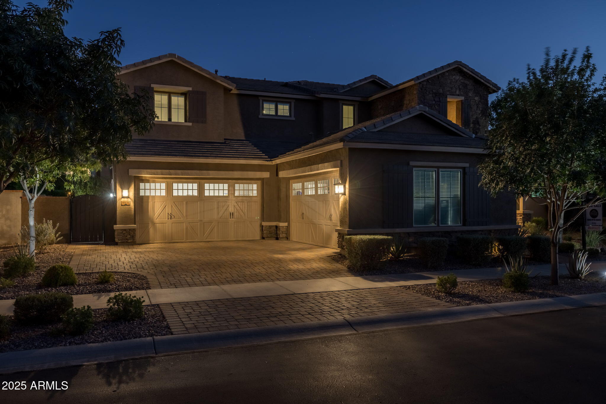 10535 Diffraction Avenue Mesa, AZ 85212 - Photo 11 of 126 a front view of a house with a yard