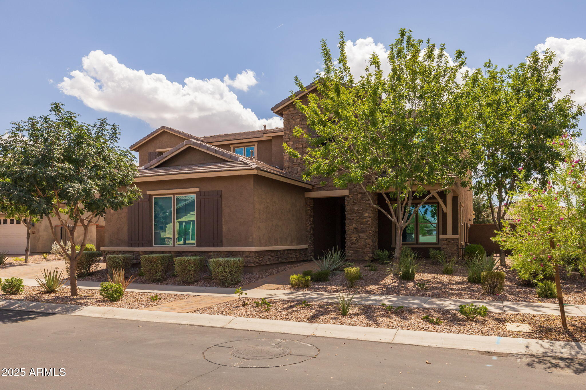 10535 Diffraction Avenue Mesa, AZ 85212 - Photo 13 of 126 a front view of a house with garden