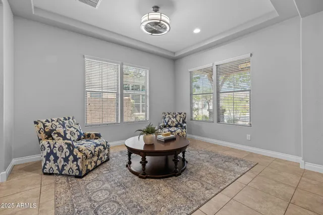 a living room with furniture and a window
