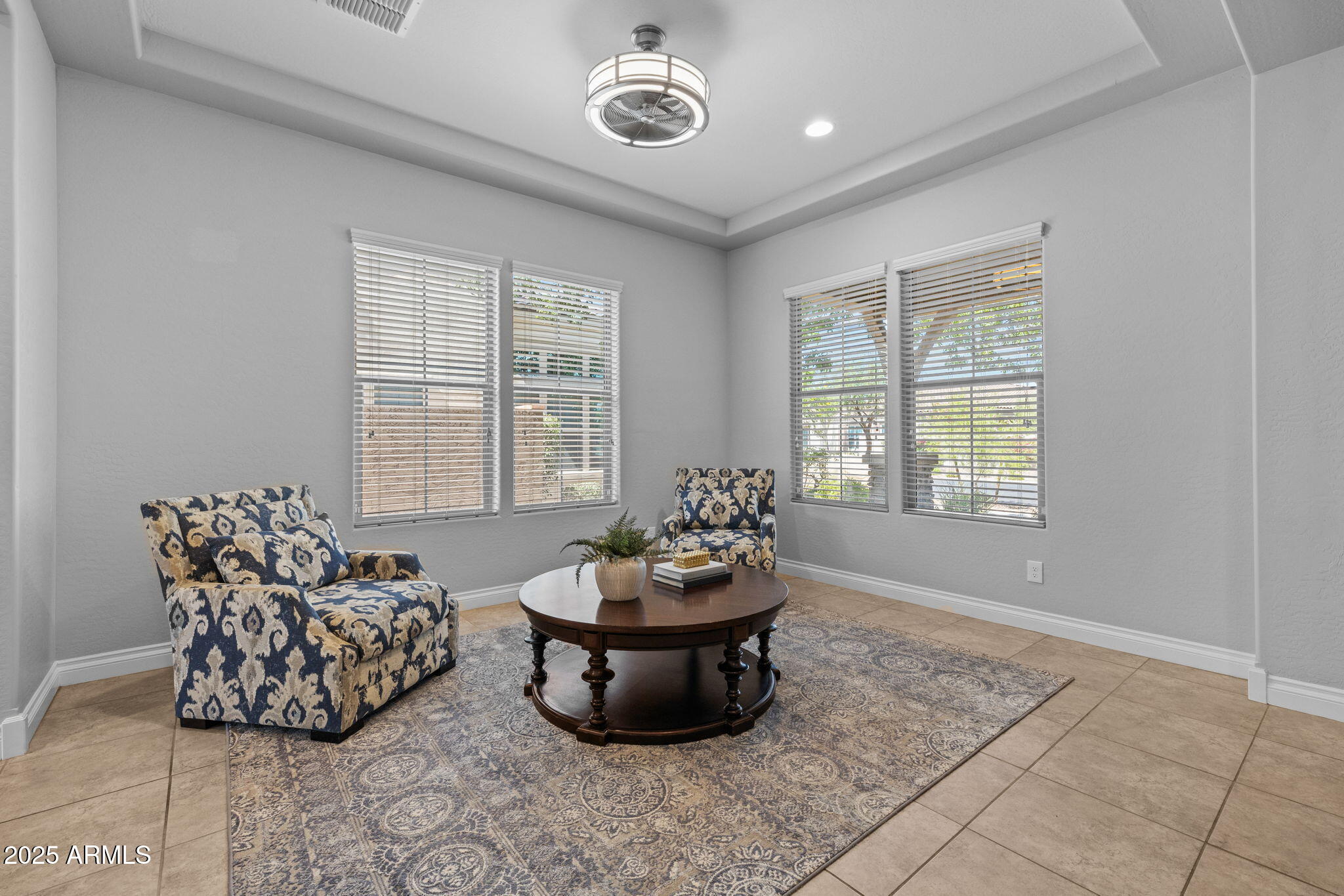 10535 Diffraction Avenue Mesa, AZ 85212 - Photo 18 of 126 a living room with furniture and a window