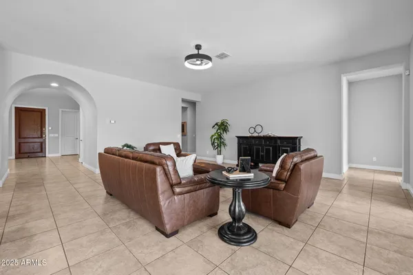 a bedroom with a bed and a table in it