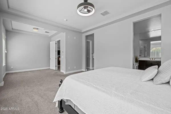 a view of a patio with a table and chairs