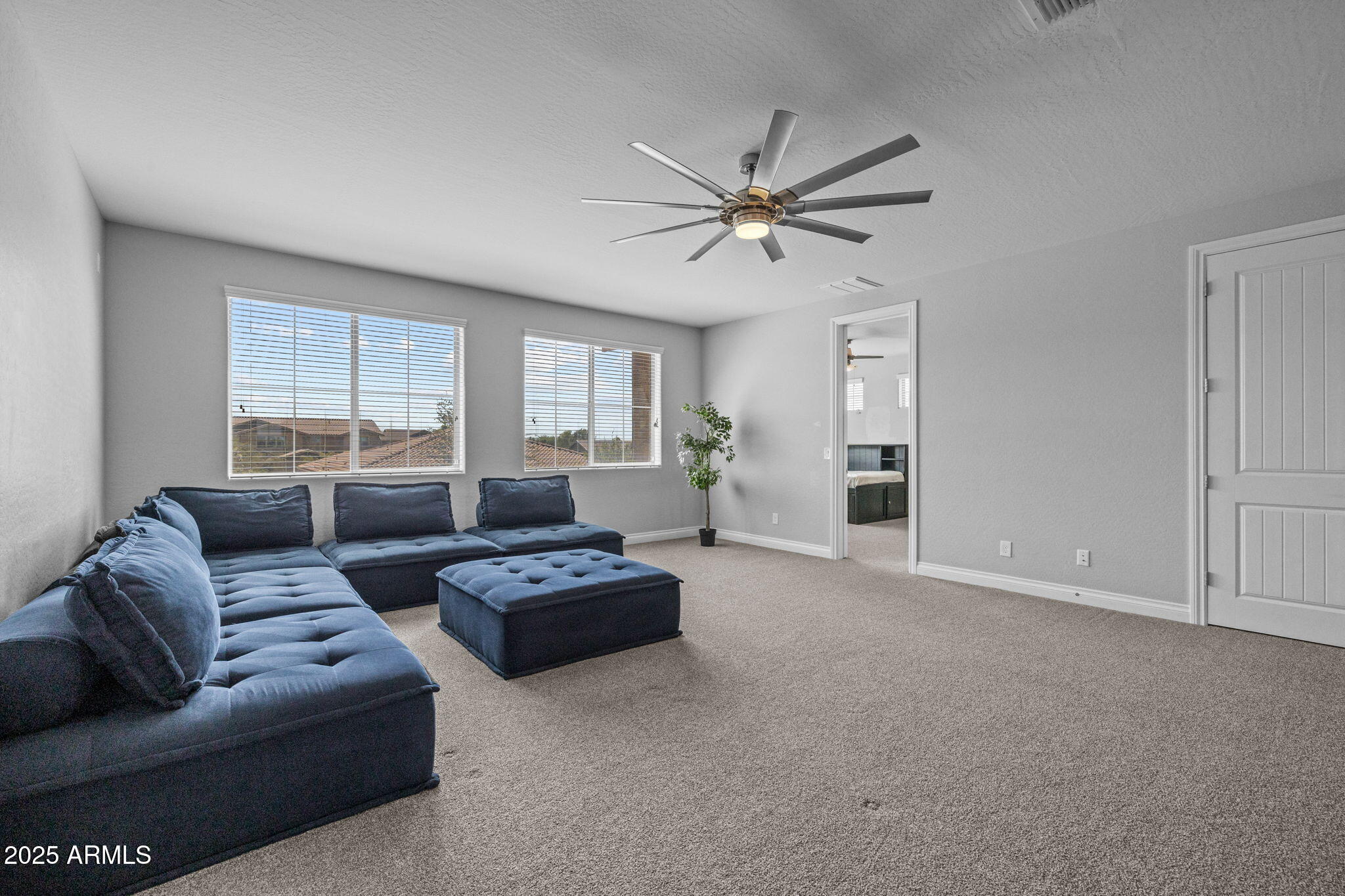 10535 Diffraction Avenue Mesa, AZ 85212 - Photo 41 of 126 a living room with furniture and a window