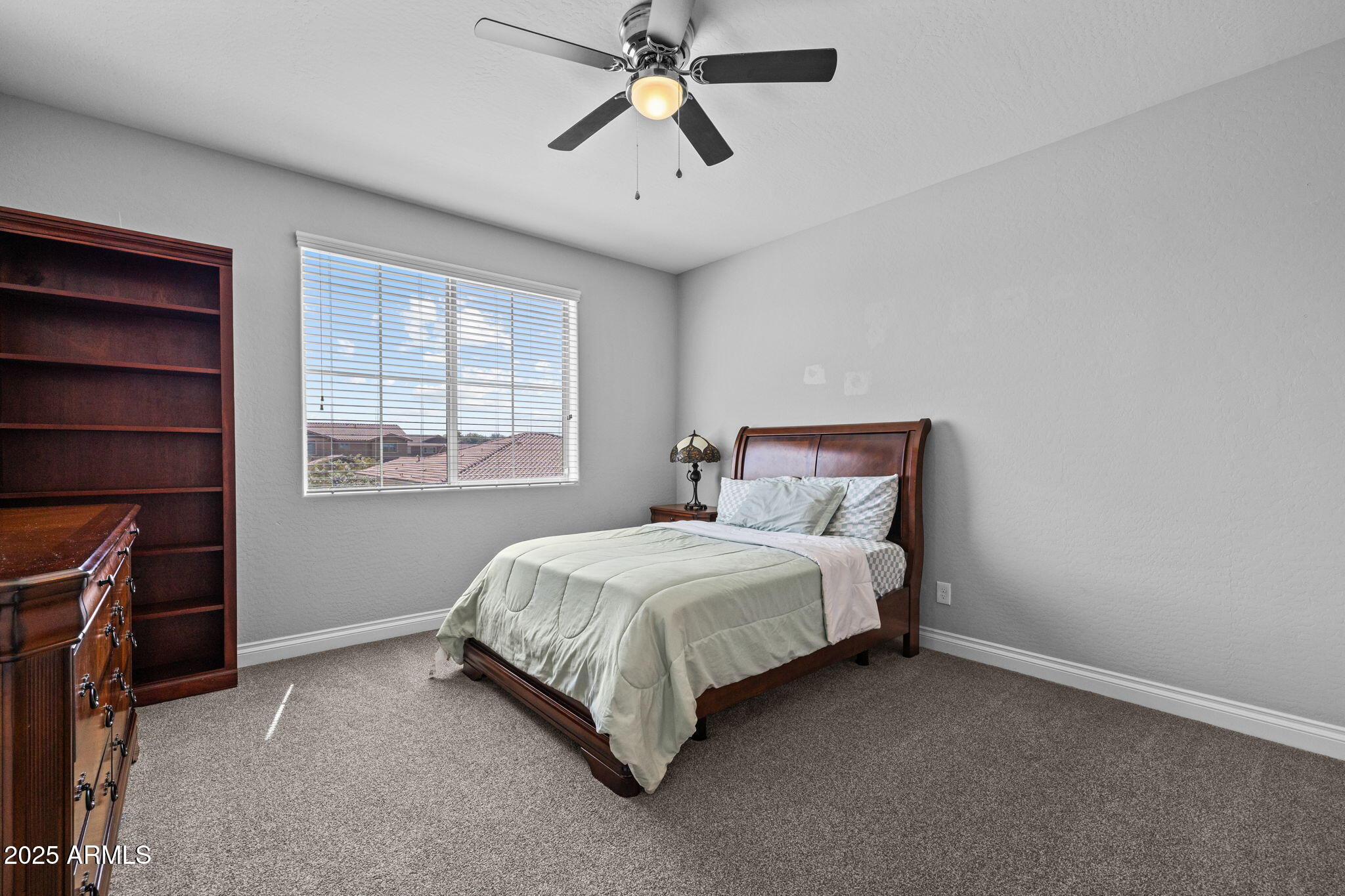10535 Diffraction Avenue Mesa, AZ 85212 - Photo 56 of 126 a spacious bedroom with a bed and a window