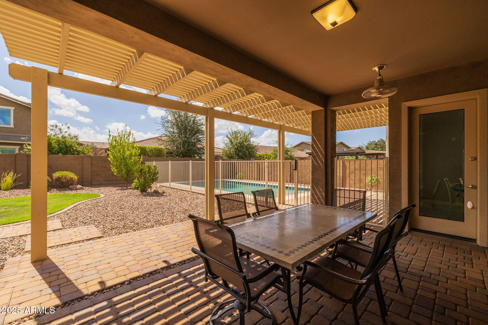 10535 Diffraction Avenue Mesa, AZ 85212 - Photo 76 of 126 a view of a patio with a table and chairs