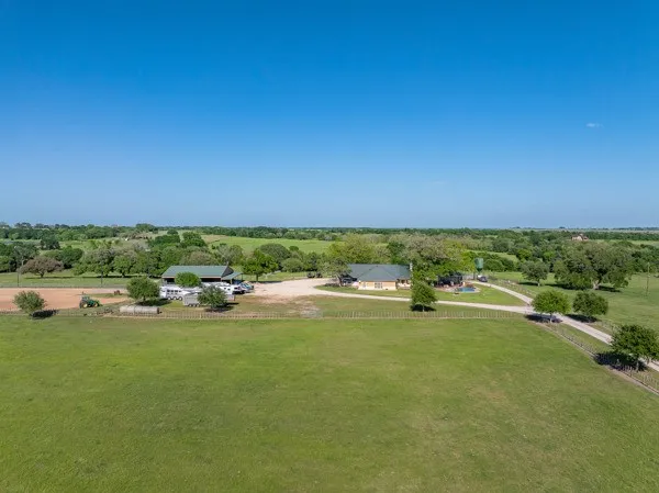 a view of a lake with a yard