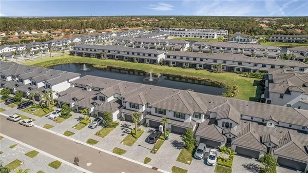 a view of a city with a lake