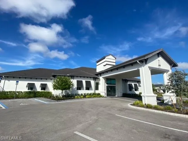 a view of a patio with a dining table and chairs