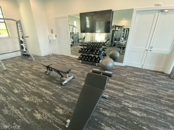 a view of a room with gym equipment
