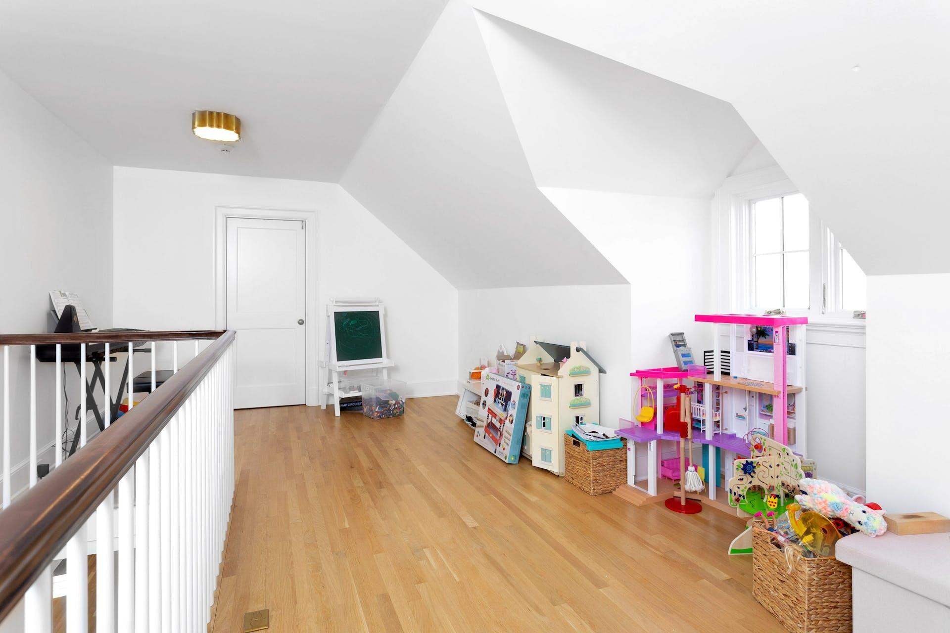 100 Pembroke Road Darien, CT 06820 - Photo 33 of 43 a bedroom with bed and a window