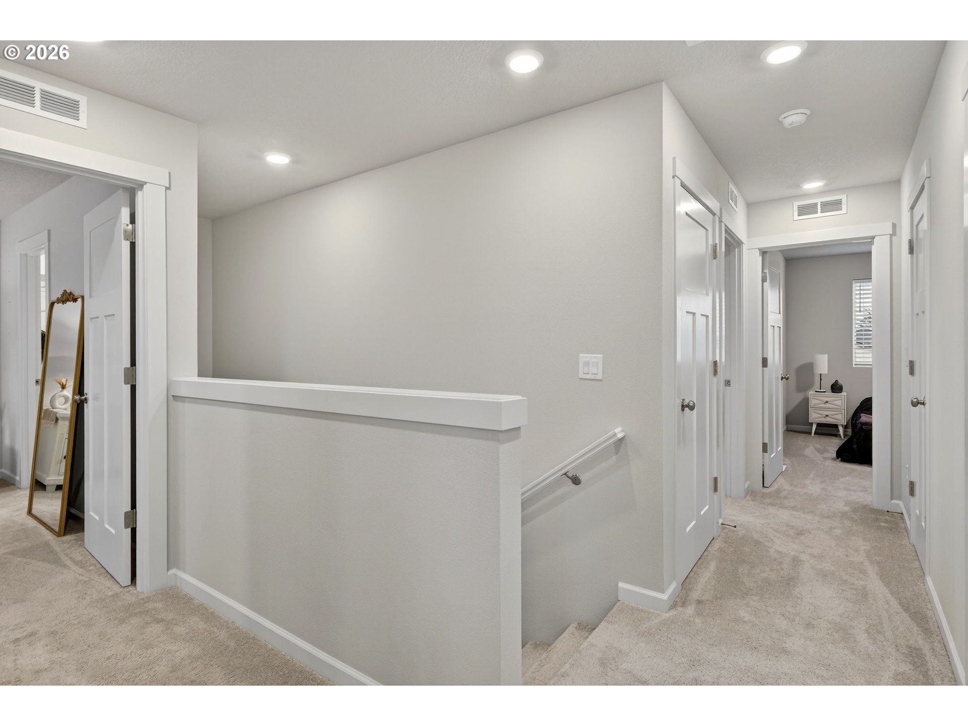 6490 Southeast 21st Terrace Gresham, OR 97080 - Photo 20 of 41 a view of a hallway with wooden shelves