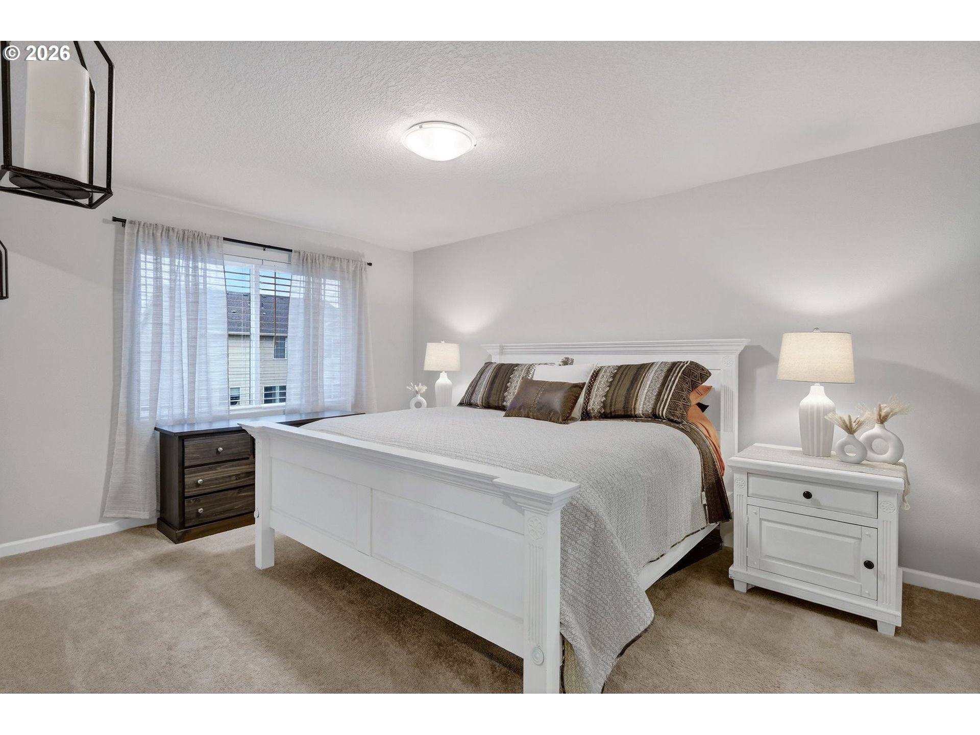 6490 Southeast 21st Terrace Gresham, OR 97080 - Photo 22 of 41 a bedroom with a bed and a night stand
