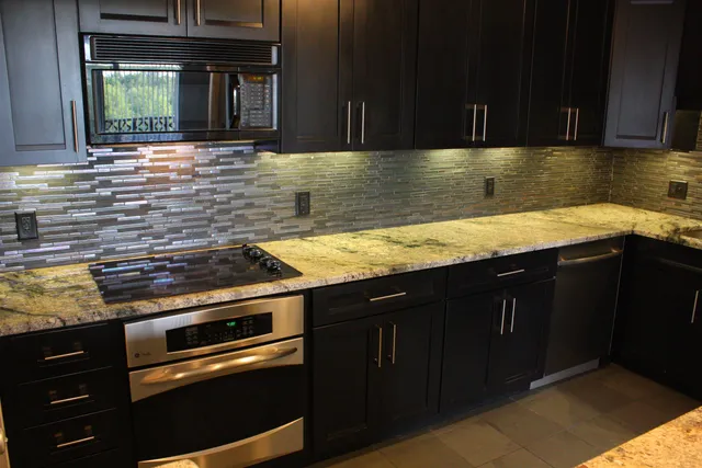 a kitchen with a sink and cabinets