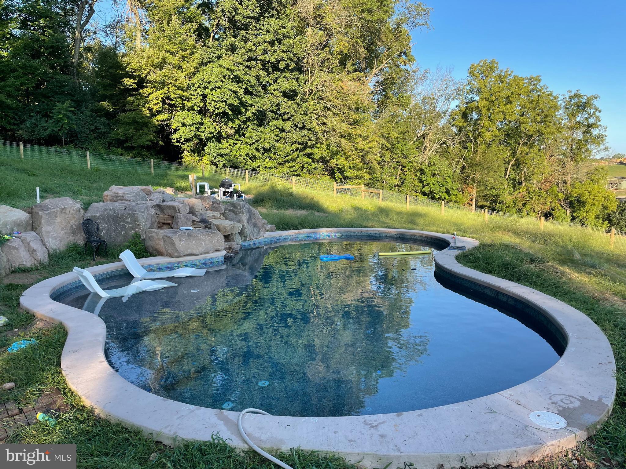 120 Alackness Road Spring City, PA 19475 - Photo 51 of 53 a view of a swimming pool with a yard
