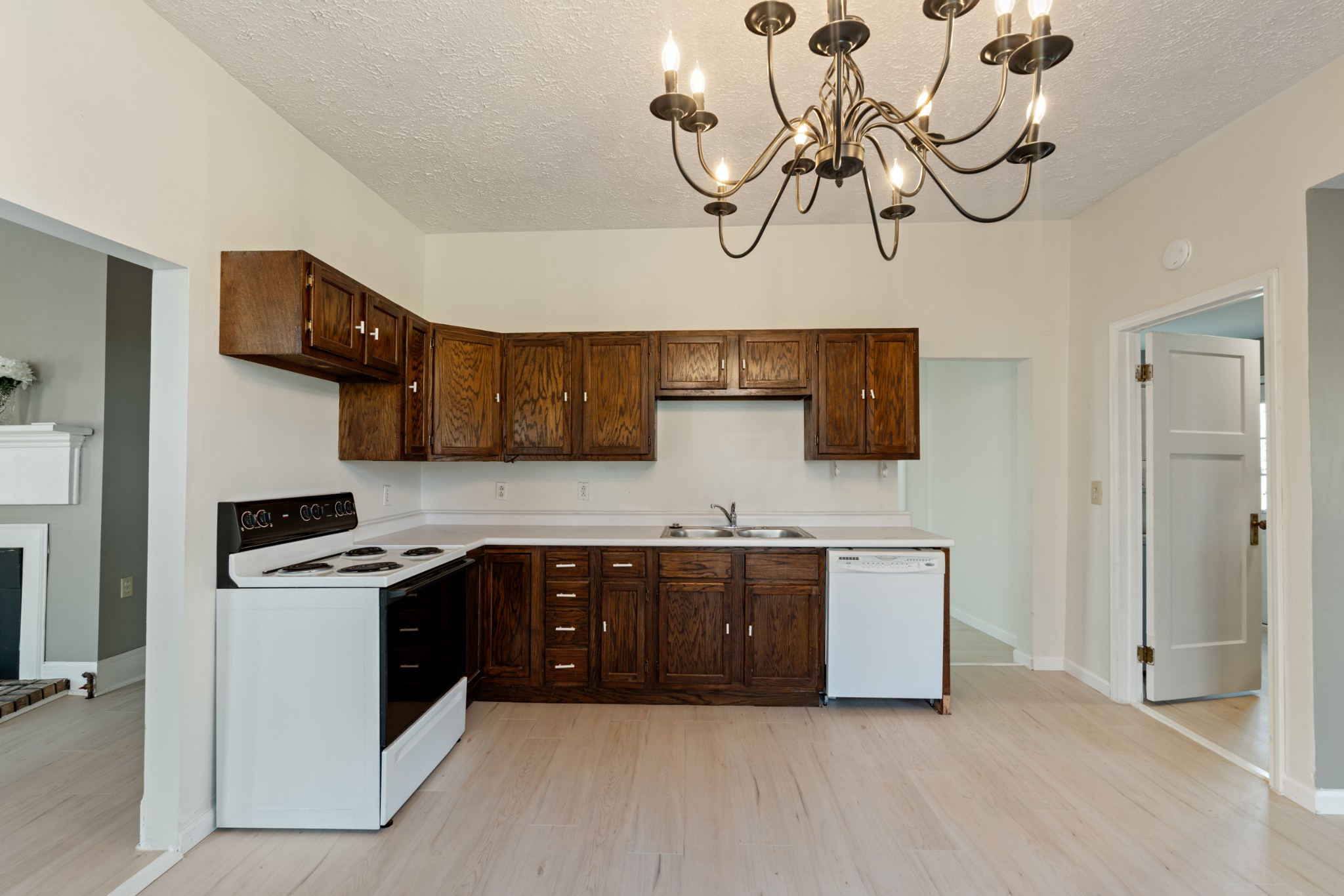 126 West End Avenue Centerville, TN 37033 - Photo 15 of 37 a kitchen with stainless steel appliances a sink a stove and cabinets