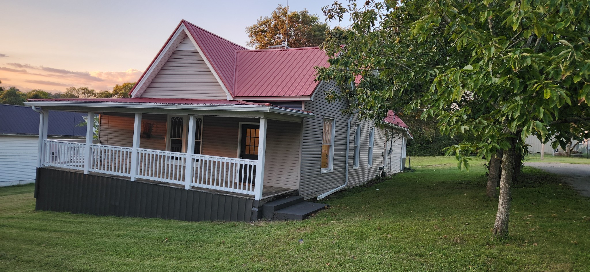 126 West End Avenue Centerville, TN 37033 - Photo 2 of 28 a view of backyard of house with green space