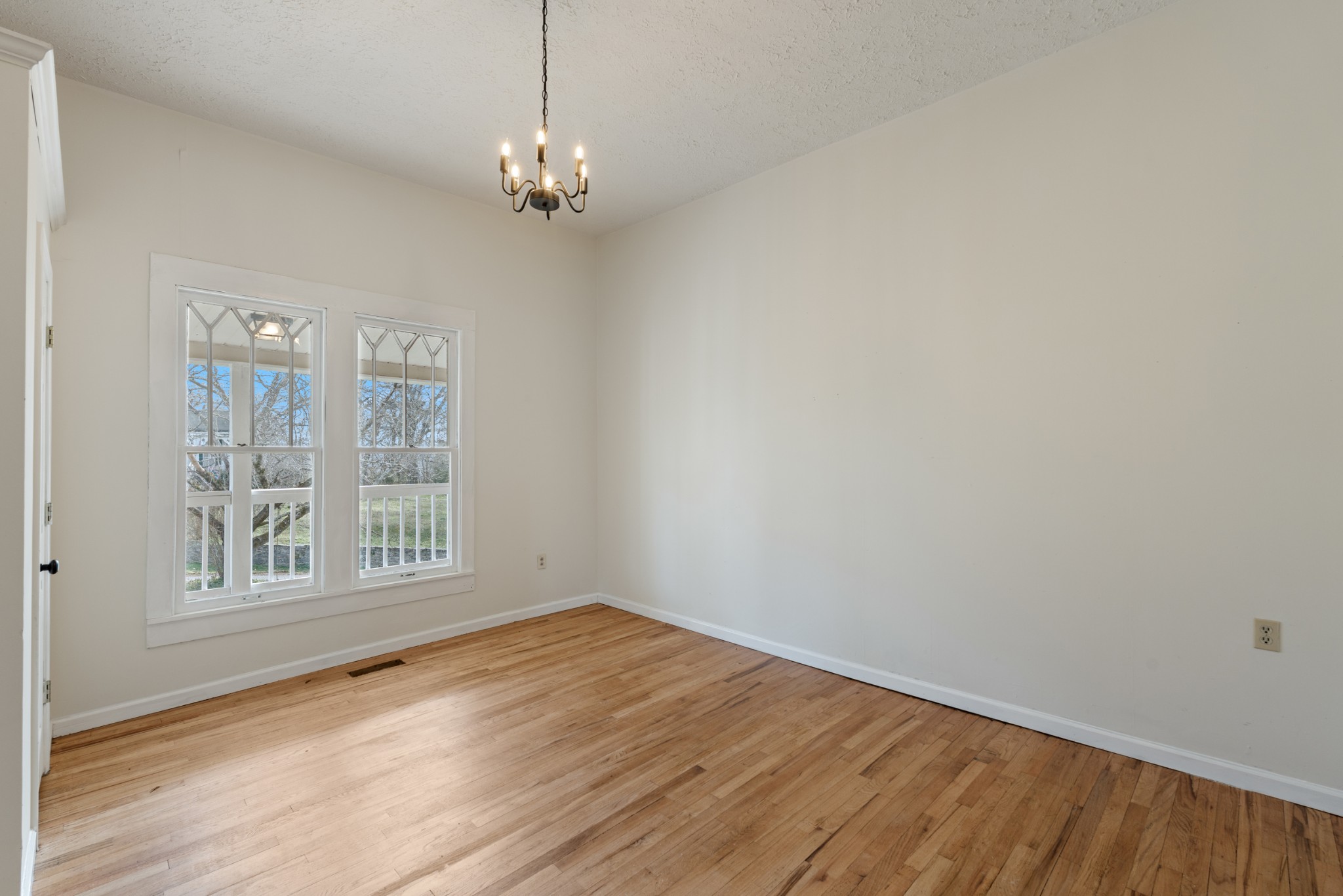 126 West End Avenue Centerville, TN 37033 - Photo 24 of 37 a view of empty room with wooden floor and fan
